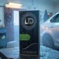 Lack Depot Express 600 VOC-Klarlack 5L can with black carbon design in a professional automotive workshop.